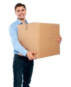Man carrying a box during his Kansas City office move