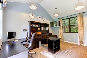 Blue modern home office interior design with dark brown furniture.